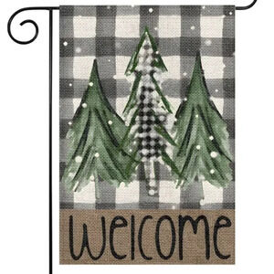 Winter trees welcome garden flag, snow